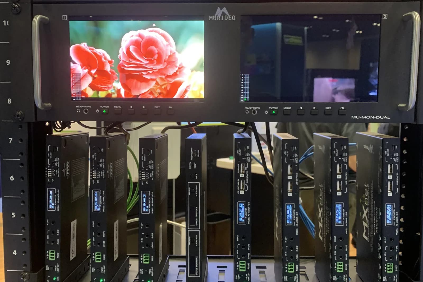 Rack-mounted AV-over-IP distribution system with dual reference monitors